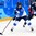 GANGNEUNG, SOUTH KOREA - FEBRUARY 19: Finland's Sanni Hakala #23 stickhandles the puck away from USA's Kacey Bellamy #22 during semifinal round action at the PyeongChang 2018 Olympic Winter Games. (Photo by Andrea Cardin/HHOF-IIHF Images)

